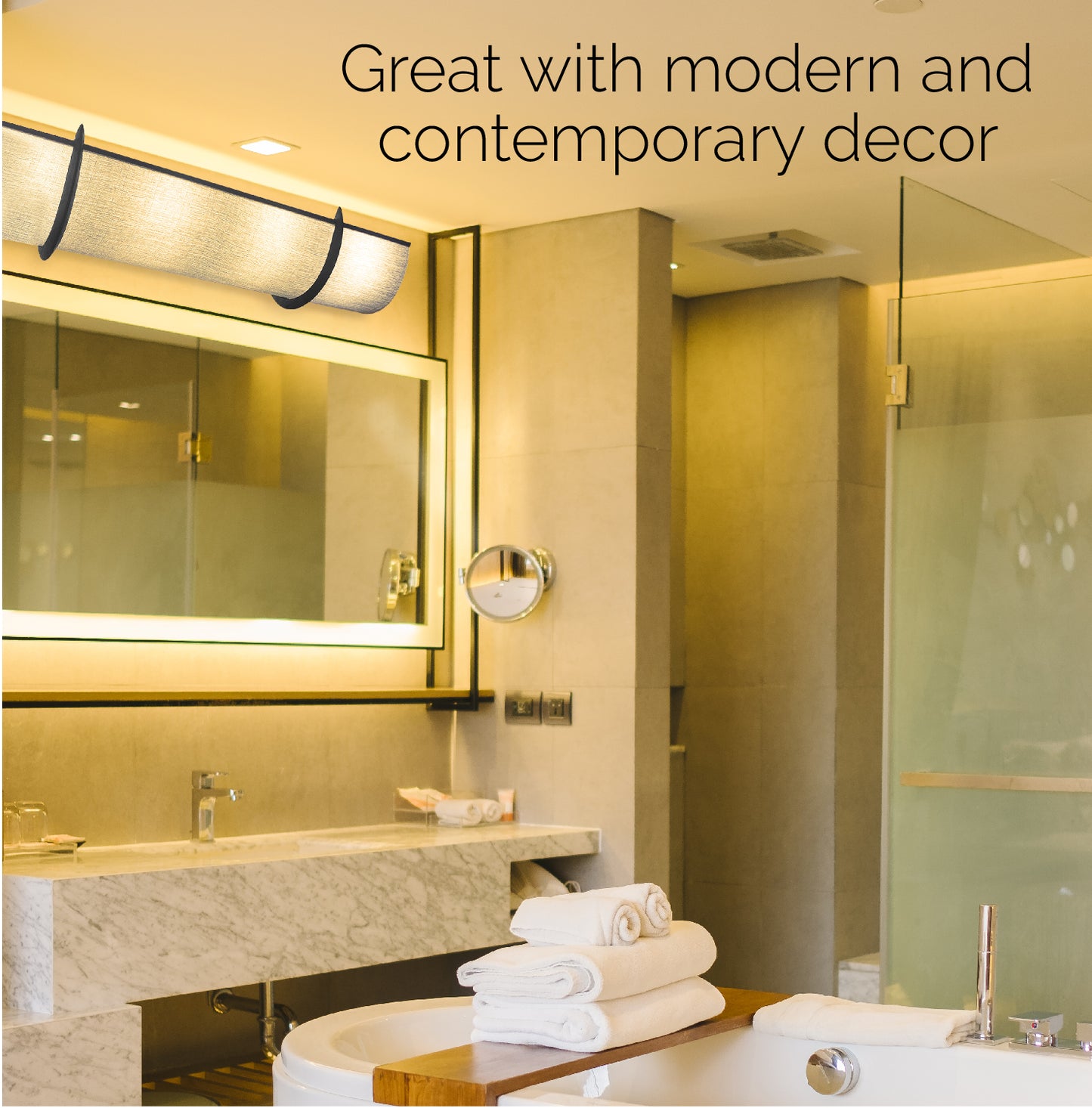 This is a contemporary bathroom with an Angela Gray EzLightWrap with black brackets above the sink. It says Great with modern and contemporary decor