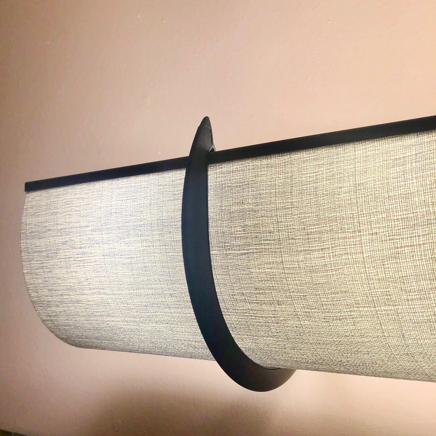 This is a description of the linen shade showing texture upclose and benefits of EzLightWraps - easy to install, handmade and lightweight. Each shade comes with their own brackets. 